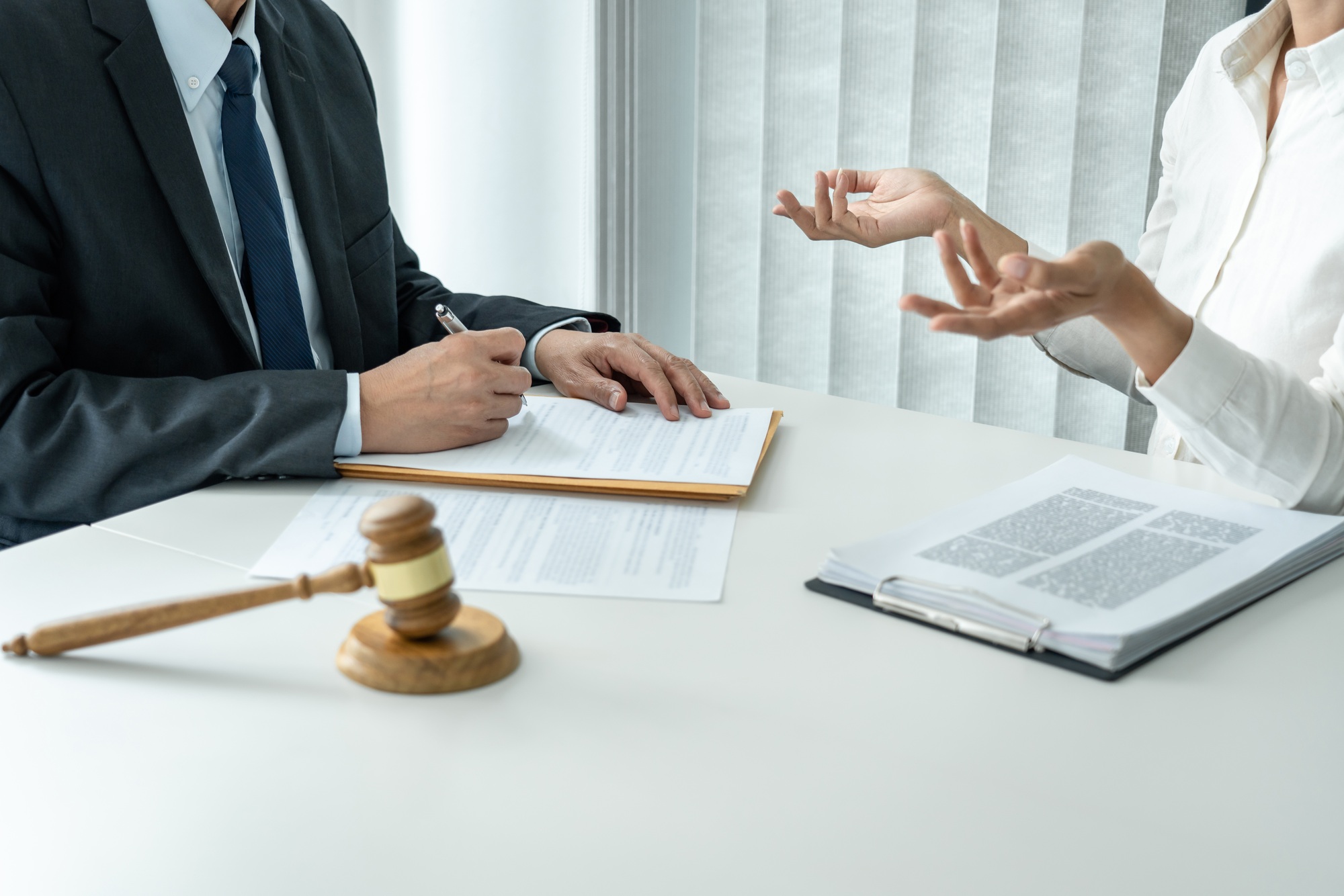 Male lawyer or notary working consulting and discussion to busin